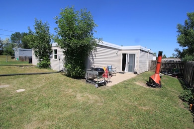 909A 21st Ave, Minot, ND 58703 - photo 3