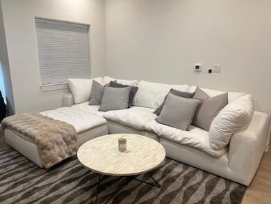 Living area with wood finished floors