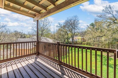 Wooden deck featuring a lawn