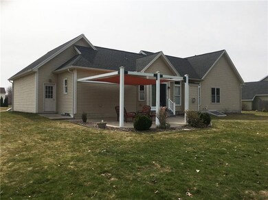 The 22'x24' garage walks out to the rear via concr