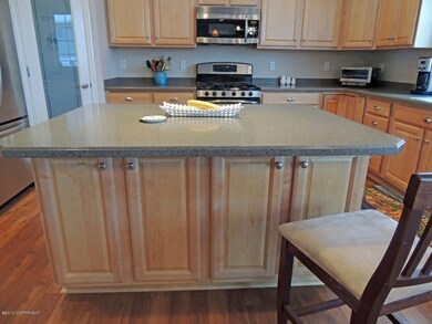 big kitchen island, cabinets both sides!