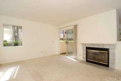 Living room with cozy fireplace...