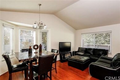 Bay windows with 2 inch blinds in dining room.