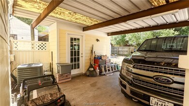 Carport in the back of the house with storage shed, recently replaced HVAC system.  Easy conversion to a garage door!