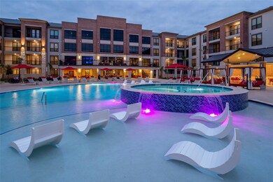Resort style pool with in water loungers