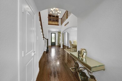 This photo showcases an elegant entryway with high