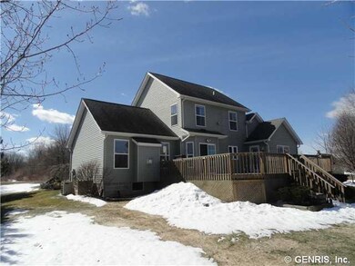 Exterior Back. Deck is 21 x 27 and it leads to a s