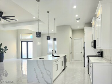 Kitchen featuring sink, stainless steel appliances