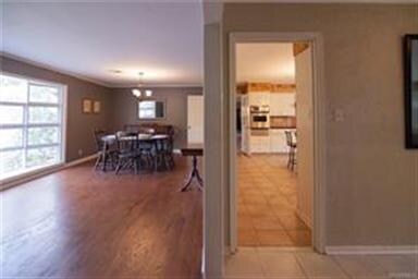 A view looking into the Foyer, Living Room and the