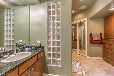 Full Primary bathroom featuring tile patterned flo