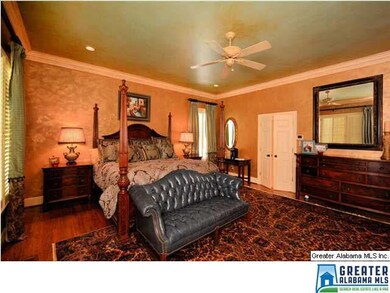 Master suite with beautiful faux paint.  Door that