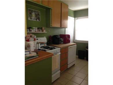 Kitchen. Dishwasher, gas stove, side door to back 