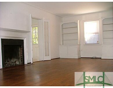 Living Room. Lots of natural light and a wood burn