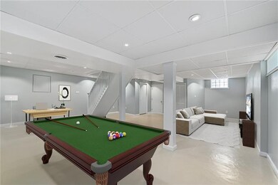 The integral garage was absorbed by the basement & finished(not by current owner) for more interior living space.  Crucial in these post-covid times.  Virtually staged to show some options.