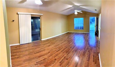 Great room With Cathedral Ceilings, Wood Floors an