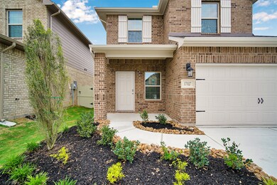 Great curb appeal as you enter the covered front porch.