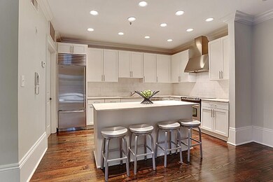 laundry room and pantry to left of refrigerator. S