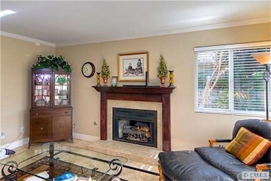 Elegant Gas Fireplace with Dark Wood Mantle adds w