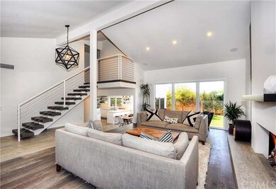 Spacious Living Room with designer lighting and mo