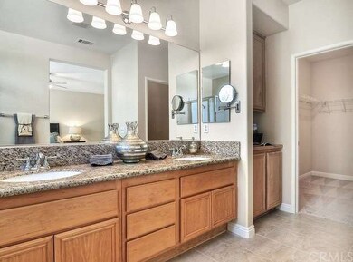 View of master bath looking toward large walk in c