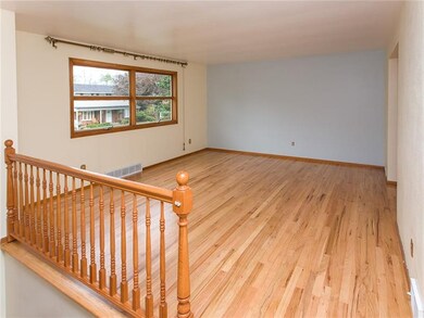 Bright hardwood floors and large windows accessori