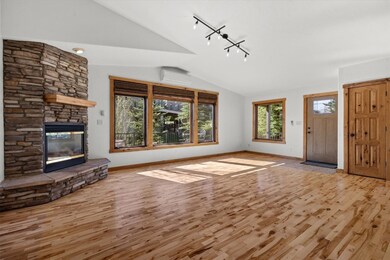Open Great Room with wood flooring