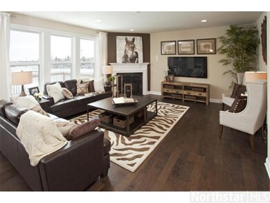 Family Room with oversized windows-Photo of Model 