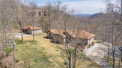 This stunning estate is nestled on 3 acres in the 