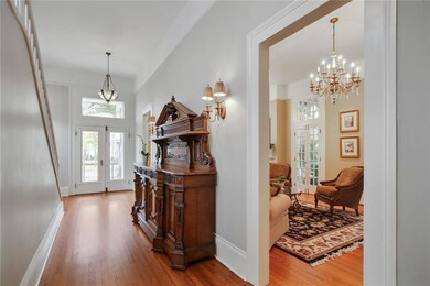 ENTRANCE FOYER -- 12 FOOT HIGH CEILINGS AND WOOD F