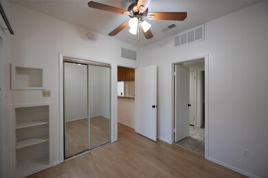 Unfurnished bedroom featuring visible vents, ligh