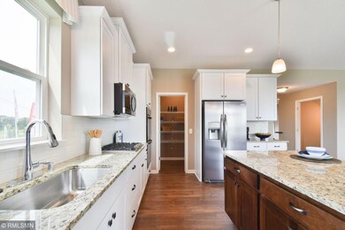Another angle of the kitchen that peers into the i