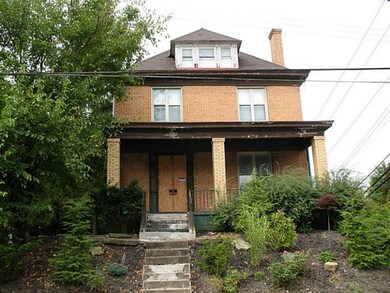 Exterior Front. Driveway90% gutted and under const