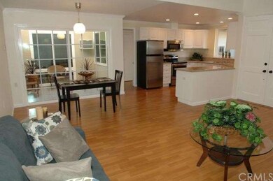 There are gleaming laminate floors throughout.  