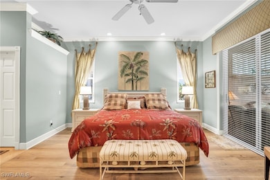 Bedroom featuring light hardwood / wood-style floo