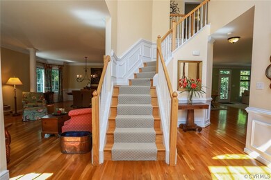 Enter the sunny 2 story formal entry boasting wain