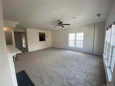 Main level family room looking toward kitchen area