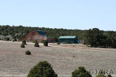 Numerous outbuildings, including shop/barn, pole b