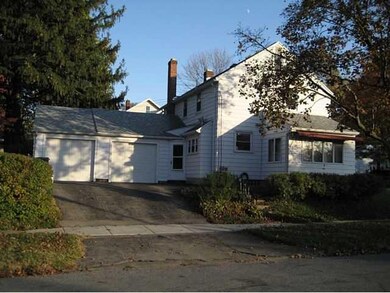 Exterior Back Home with enclosed porch and 2 car g