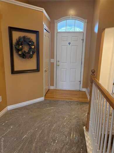 1167 Creekside Ct unit 28, Burton, MI 48509 - photo 2