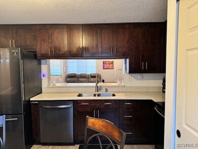 Kitchen featuring appliances with stainless steel