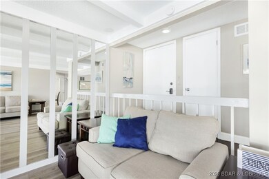 Front entry opens onto a landing overlooking the l