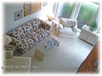 VIEW OF LIVING ROOM FROM UPSTAIRS