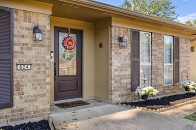 Property entrance with brick siding