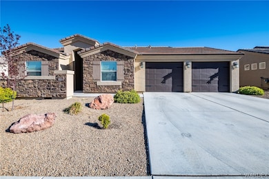 View of front of property with a garage