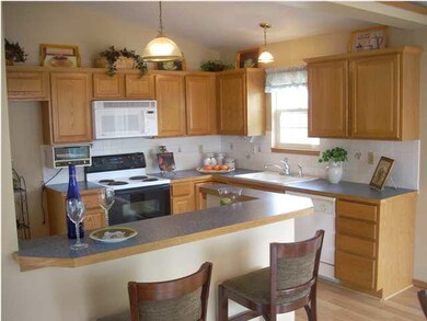 Kitchen area with the breakfast bar.
