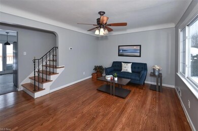 Main living area with refinished hardwood floors