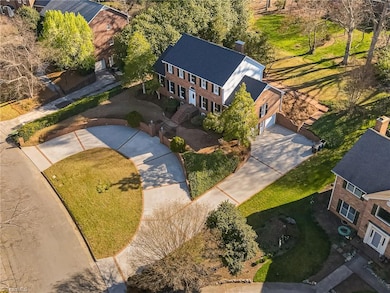 Plenty of parking on circular drive plus 2-car garage.