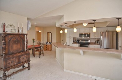 Breakfast bar in the kitchen is a added feature. Upgraded appliances and lighting round out this well thought out kitchen.