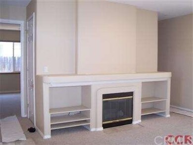 Gas fireplace and entertainment area in livingroom