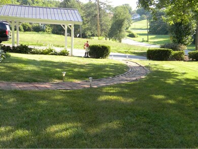 Sidewalk with covered carport